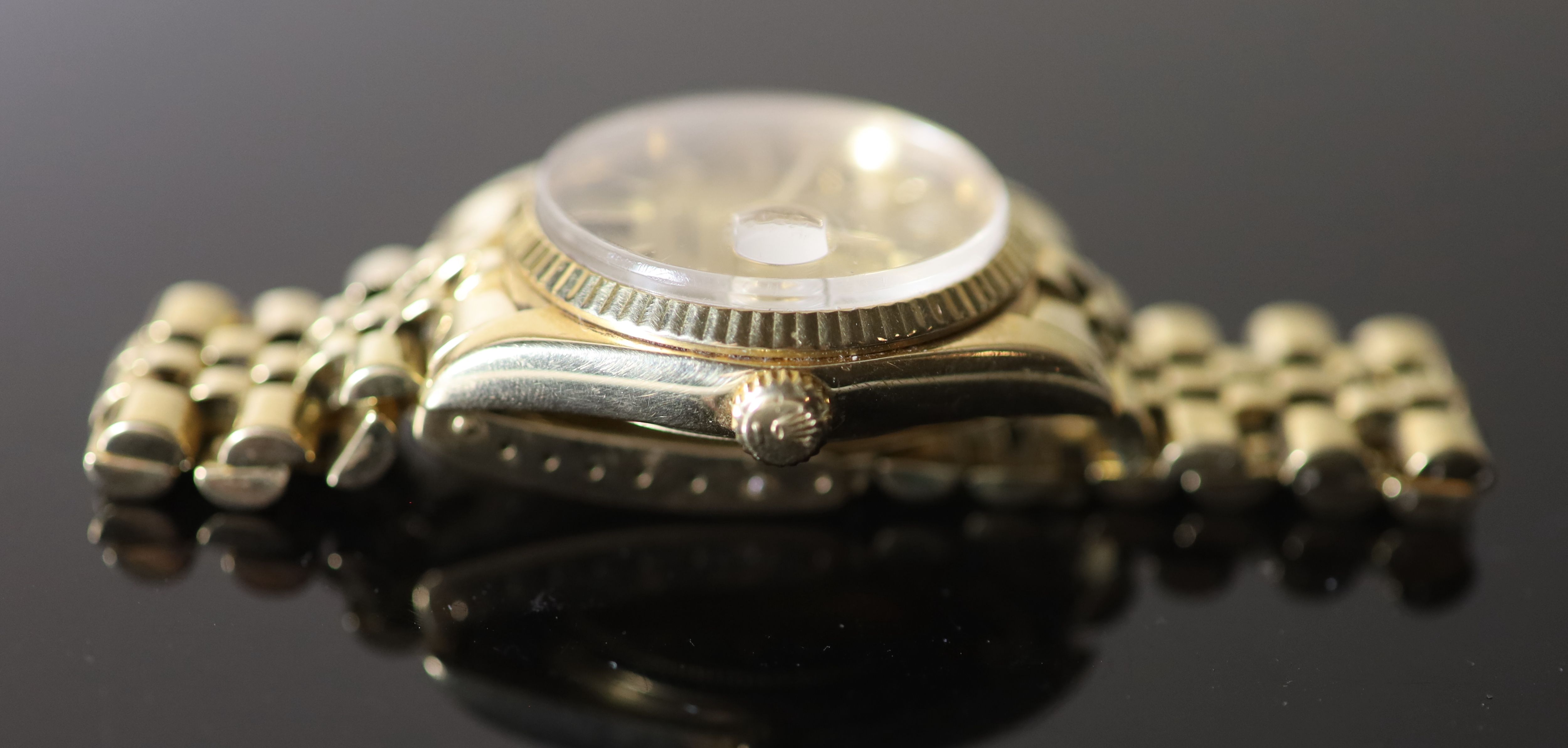 A gentlemans 1990s? 18k gold Rolex Oyster Perpetual Datejust wrist watch, on a 18k gold Rolex bracelet,
